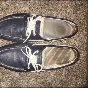 Blue and white Sperry boat shoes.